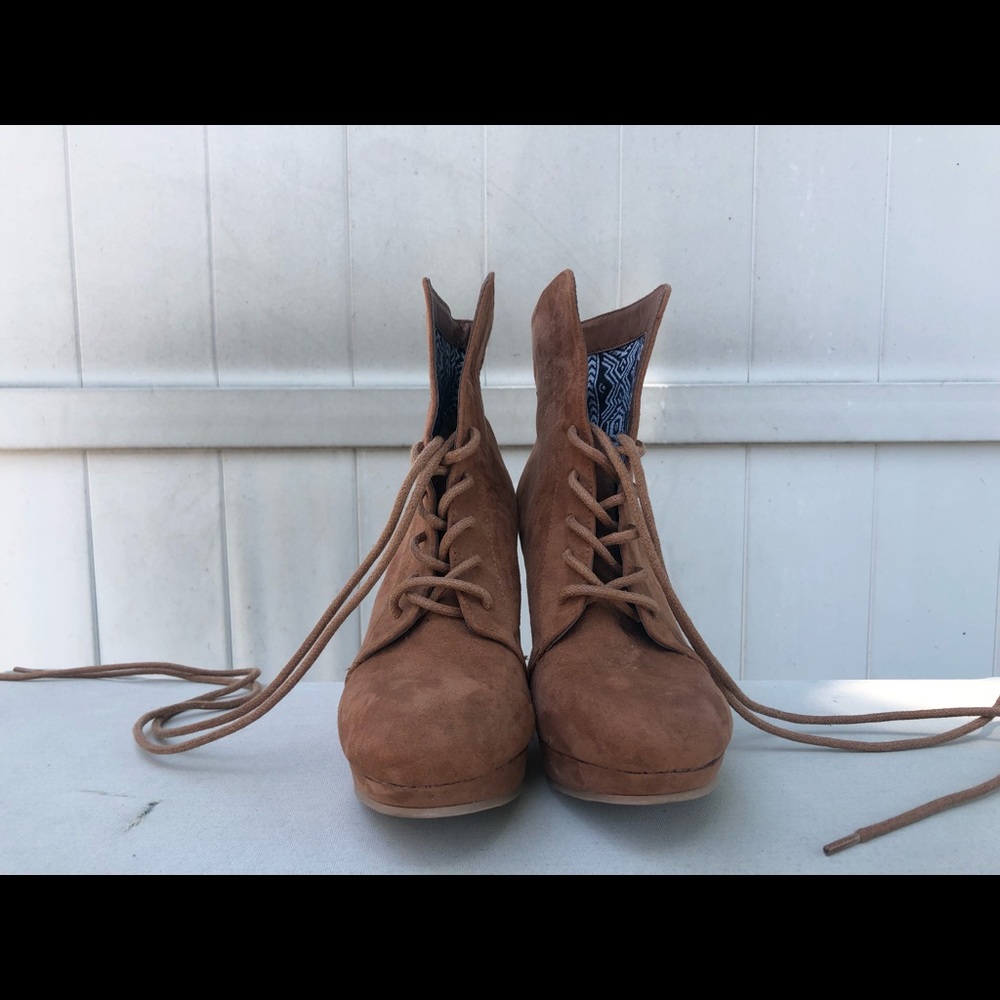 Swayed high heel boots